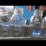Automaattinen kaksoispuolinen muovinen neliömäisten pullojen etiketöintikone